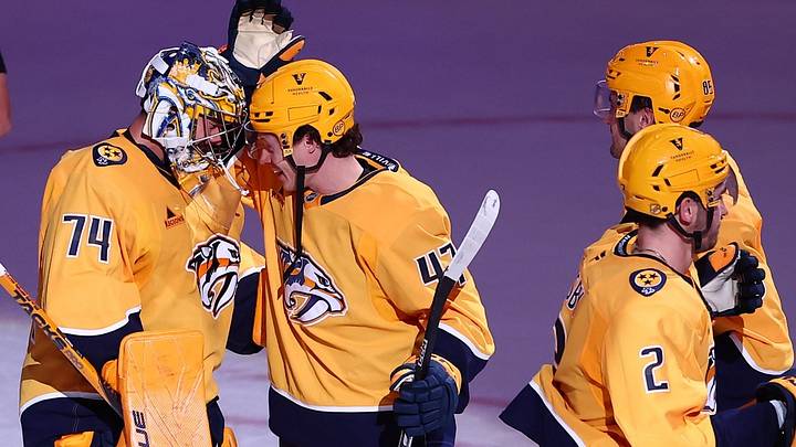 Jack Ahcan and Juuse Saros hug after Nashville's 2-1 victory over Dallas. Jack Ahcan and Juuse Saros hug after Nashville's 2-1 victory over Dallas.