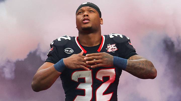 Houston Texans running back David Montgomery (32) is introduced before playing against the Cincinnati Bengals at Reliant Stadium. Mandatory Credit: Thomas Shea-Imagn Images