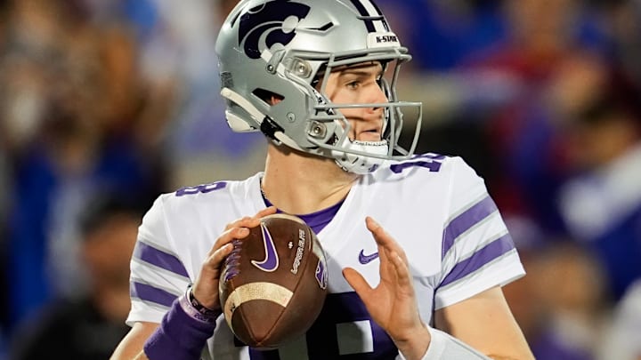Nov 18, 2023; Lawrence, Kansas, USA; Kansas State Wildcats quarterback Will Howard (18) during the