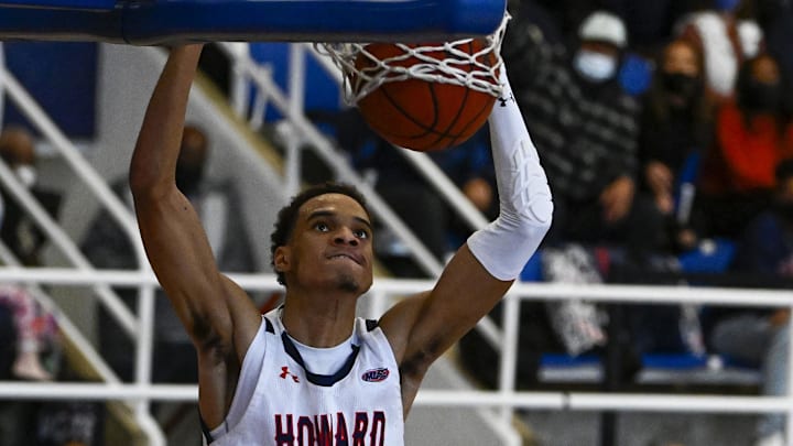 Jan 17, 2022; Washington, District of Columbia, USA; Howard Bison forward Steve Settle III (2) dunks the ball against the Notre Dame Fighting Irish during the second half at Burr Gymnasium. Mandatory Credit: Brad Mills-Imagn Images