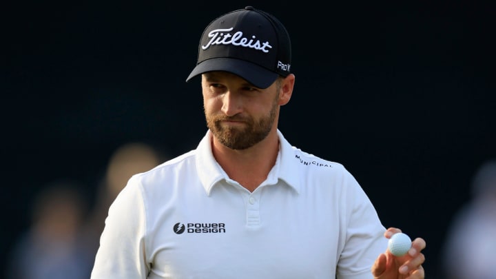 Wyndham Clark thanks the crowd after his sunk putt on hole 13 during the third round of The Players Championship PGA golf tournament Saturday, March 16, 2024 at TPC Sawgrass in Ponte Vedra Beach, Fla. Xander Schauffele finished atop the leader board at 17 under par and Wyndham Clark in second at 16 under par.
