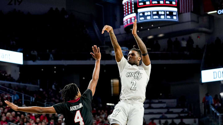 Cincinnati Bearcats guard Jizzle James (2) hits a basket in the second half of a NCAA men’s basketball game between the Cincinnati Bearcats and Texas Tech Red Raiders, Tuesday, Jan. 21, 2025, at Fifth Third Arena in Cincinnati. Red Raiders won 81-71. Cincinnati Bearcats guard Jizzle James (2) hits a basket in the second half of a NCAA men’s basketball game between the Cincinnati Bearcats and Texas Tech Red Raiders, Tuesday, Jan. 21, 2025, at Fifth Third Arena in Cincinnati. Red Raiders won 81-71.