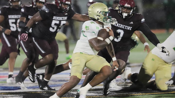 Benedictine's LaDamion Guyton zeros in on Buford's Dylan McCoy during Benedictine's home opener on Friday, August 22, 2025 at Memorial Stadium.