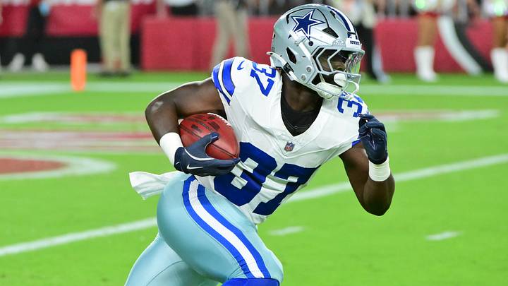 Dallas Cowboys running back Phil Mafah runs the ball in the first half against the Arizona Cardinals at State Farm Stadium. Dallas Cowboys running back Phil Mafah runs the ball in the first half against the Arizona Cardinals at State Farm Stadium.