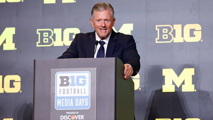 Michigan Football head coach Kyle Whittingham speaks during Big Ten Media Days at Hilton Chicago Michigan Football head coach Kyle Whittingham speaks during Big Ten Media Days at Hilton Chicago