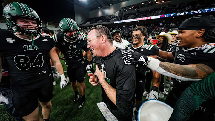 Ohio is hiring defensive coordinator John Hauser as the school's new head coach.