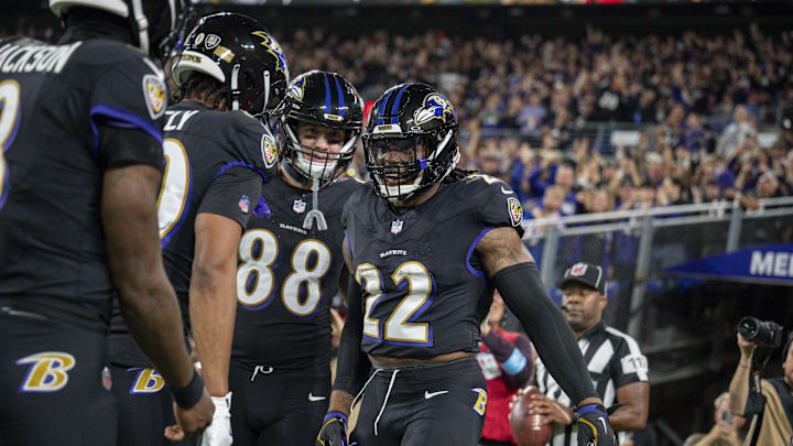 Sep 29, 2024; Baltimore, Maryland, USA;  Baltimore Ravens running back Derrick Henry (22) celebrates with teammates after scoring during the second quarter against the Buffalo Bills at M&T Bank Stadium. Mandatory Credit: Tommy Gilligan-Imagn Images