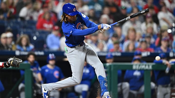 Sep 25, 2024; Philadelphia, Pennsylvania, USA; Chicago Cubs outfielder Kevin Alcantara (13) hits an infield single against the Philadelphia Phillies in the ninth inning at Citizens Bank Park.