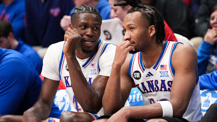 Jan 16, 2026; Lawrence, Kansas, USA; Kansas Jayhawks forward Flory Bidunga (40) and guard Darryn Peterson (22) talk on the bench against the Baylor Bears during the second half of the game at Allen Fieldhouse. Mandatory Credit: Denny Medley-Imagn Images Jan 16, 2026; Lawrence, Kansas, USA; Kansas Jayhawks forward Flory Bidunga (40) and guard Darryn Peterson (22) talk on the bench against the Baylor Bears during the second half of the game at Allen Fieldhouse. Mandatory Credit: Denny Medley-Imagn Images