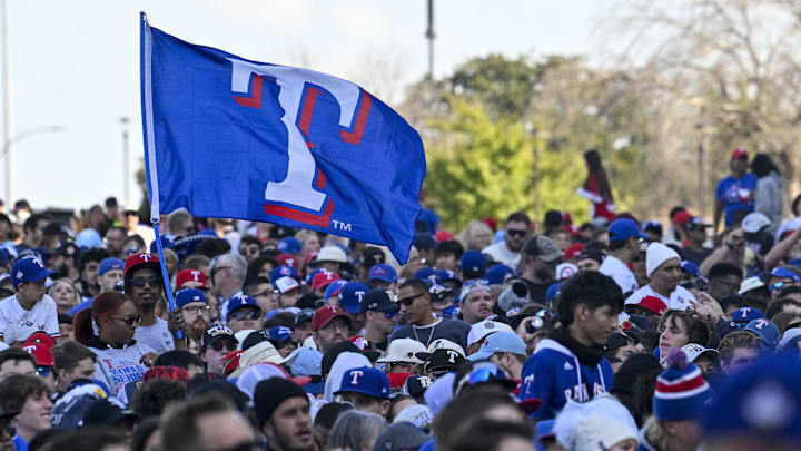 Nov 3, 2023; Arlington, TX, USA; A view of the Texas Rangers fans and flags during the World Series championship parade at Globe Life Field. Mandatory Credit: Jerome Miron-Imagn Images