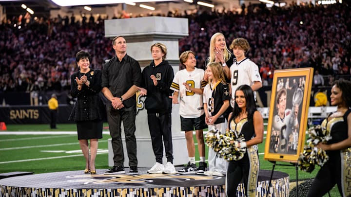 Drew Brees (9) reacts during his hall of fame ceremony at halftime with the New Orleans Saints Drew Brees (9) reacts during his hall of fame ceremony at halftime with the New Orleans Saints