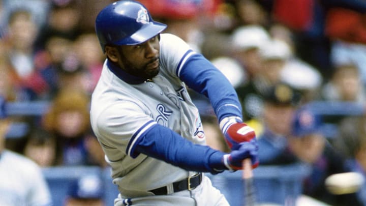 Apr 19, 1993; Cleveland, OH, USA; FILE PHOTO; Toronto Blue Jays outfielder Joe Carter hits a home run