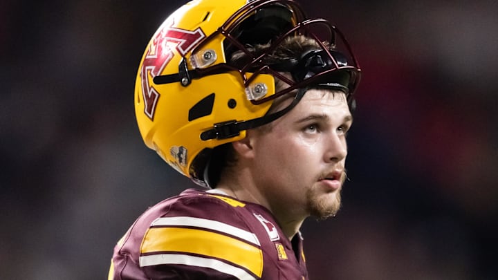 Dec 26, 2025; Phoenix, AZ, USA; Minnesota Golden Gophers quarterback Drake Lindsey (5) against the New Mexico Lobos during the Rate Bowl at Chase Field. Mandatory Credit: Mark J. Rebilas-Imagn Images Dec 26, 2025; Phoenix, AZ, USA; Minnesota Golden Gophers quarterback Drake Lindsey (5) against the New Mexico Lobos during the Rate Bowl at Chase Field. Mandatory Credit: Mark J. Rebilas-Imagn Images