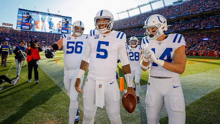Dec 15, 2024; Denver, Colorado, USA; Indianapolis Colts quarterback Anthony Richardson (5) celebrates with guard Quenton Nelson (56) and wide receiver Alec Pierce (14) after a touchdown in the first quarter against the Denver Broncos at Empower Field at Mile High. Mandatory Credit: Isaiah J. Downing-Imagn Images