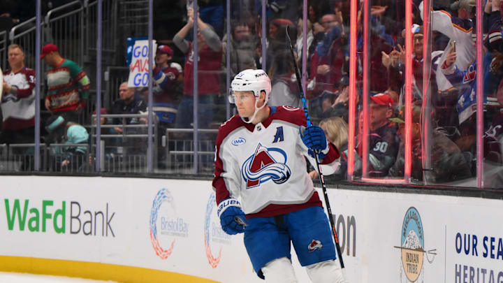 Dec 16, 2025; Seattle, Washington, USA; Colorado Avalanche center Nathan MacKinnon (29) celebrates after scoring an empty net goal against the Seattle Kraken during the third period at Climate Pledge Arena. Mandatory Credit: Steven Bisig-Imagn Images Dec 16, 2025; Seattle, Washington, USA; Colorado Avalanche center Nathan MacKinnon (29) celebrates after scoring an empty net goal against the Seattle Kraken during the third period at Climate Pledge Arena. Mandatory Credit: Steven Bisig-Imagn Images