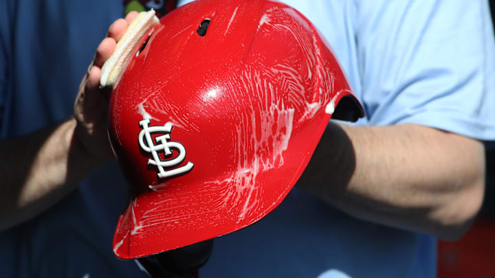 Apr 9, 2025; Pittsburgh, Pennsylvania, USA; The St. Louis Cardinals equipment manger scrubs the team batting helmets before the game against the Pittsburgh Pirates at PNC Park. Mandatory Credit: Charles LeClaire-Imagn Images Apr 9, 2025; Pittsburgh, Pennsylvania, USA; The St. Louis Cardinals equipment manger scrubs the team batting helmets before the game against the Pittsburgh Pirates at PNC Park. Mandatory Credit: Charles LeClaire-Imagn Images