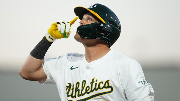 Jul 9, 2025; West Sacramento, California, USA;  Athletics third baseman Gio Urshela (13) reacts after hitting an RBI single against the Atlanta Braves in the sixth inning at Sutter Health Park.