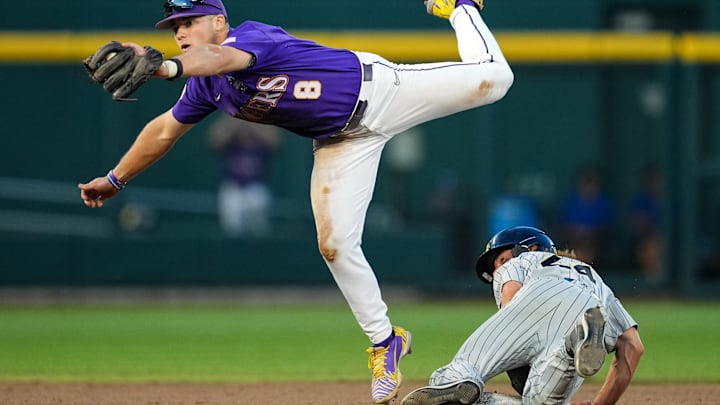 Current Cleveland Guardians prospect Tommy Hawke steals a base vs the LSU Tigers while playing for Wake Forest University.