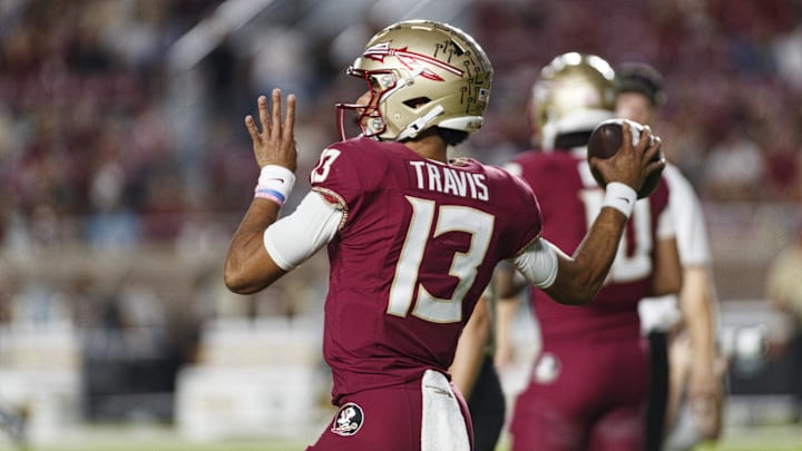 Nov 18, 2023; Tallahassee, Florida, USA; Florida State Seminoles quarterback Jordan Travis (13) throws a pass during the warm ups against the North Alabama Lions at Doak S. Campbell Stadium. Mandatory Credit: Morgan Tencza-USA TODAY Sports