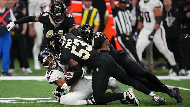 Nov 23, 2025; New Orleans, Louisiana, USA; Atlanta Falcons wide receiver Dylan Drummond (81) is tackled by New Orleans Saints linebacker Jaylan Ford (53) and defensive end Chris Rumph II (58) during the first half at Caesars Superdome. Mandatory Credit: Matthew Hinton-Imagn Images Nov 23, 2025; New Orleans, Louisiana, USA; Atlanta Falcons wide receiver Dylan Drummond (81) is tackled by New Orleans Saints linebacker Jaylan Ford (53) and defensive end Chris Rumph II (58) during the first half at Caesars Superdome. Mandatory Credit: Matthew Hinton-Imagn Images