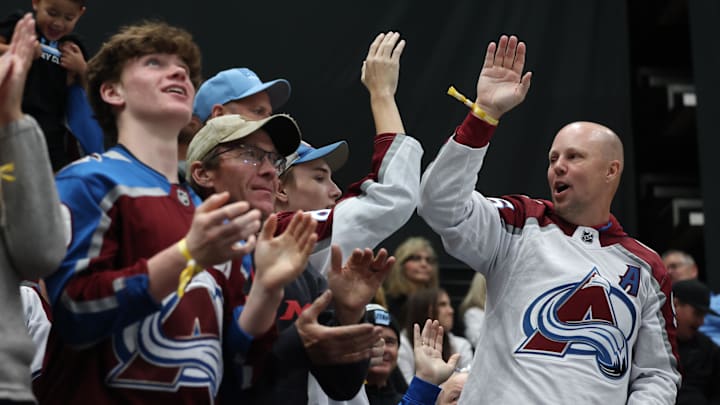 Oct 24, 2024; Salt Lake City, Utah, USA; Colorado Avalanche fans celebrate a goal against the Utah Hockey Club during the third period at Delta Center. Mandatory Credit: Rob Gray-Imagn Images Oct 24, 2024; Salt Lake City, Utah, USA; Colorado Avalanche fans celebrate a goal against the Utah Hockey Club during the third period at Delta Center. Mandatory Credit: Rob Gray-Imagn Images