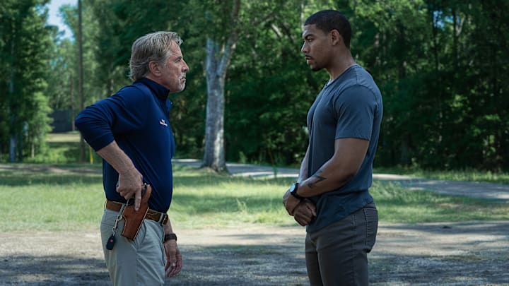 Rebel Ridge. (L-R) Don Johnson as Chief Sandy Burnne and Aaron Pierre as Terry Richmond in Rebel Ridge. Cr. Allyson Riggs/Netflix © 2024.