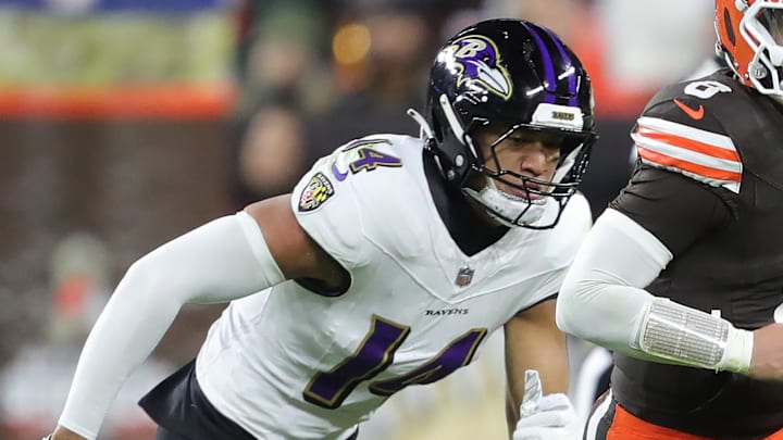 Cleveland Browns quarterback Dillon Gabriel (8) runs to the sideline away from Baltimore Ravens safety Kyle Hamilton (14) during the first half of an NFL football game at Huntington Bank Field, Nov. 16, 2025, in Cleveland, Ohio.