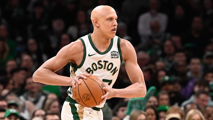 Feb 4, 2024; Boston, Massachusetts, USA; Boston Celtics guard Jordan Walsh (27) passes the ball during the second half against the Memphis Grizzlies at TD Garden. Mandatory Credit: Eric Canha-Imagn Images