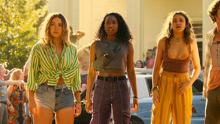 Outer Banks. (L to R) Madelyn Cline as Sarah Cameron, Carlacia Grant as Cleo, Madison Bailey as Kiara, Chase Stokes as John B, Jonathan Daviss as Pope in episode 406 of Outer Banks. Cr. Jackson Lee Davis/Netflix © 2024