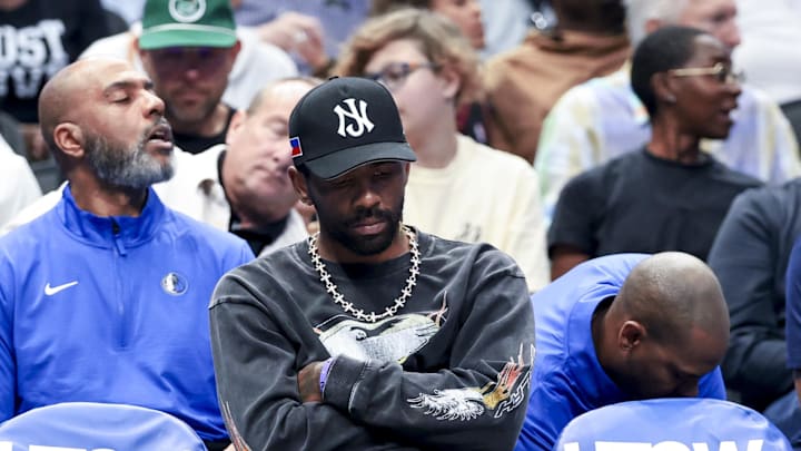 Mar 16, 2025; Mavericks guard Kyrie Irving sits on the bench against the Philadelphia 76ers at American Airlines Center. Credit: Kevin Jairaj-Imagn Images