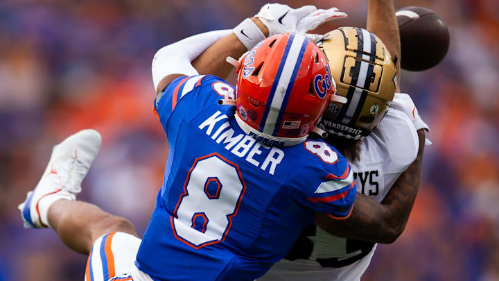 Florida Gators cornerback Jalen Kimber (8) breaks up a pass intended for Vanderbilt Commodores wide