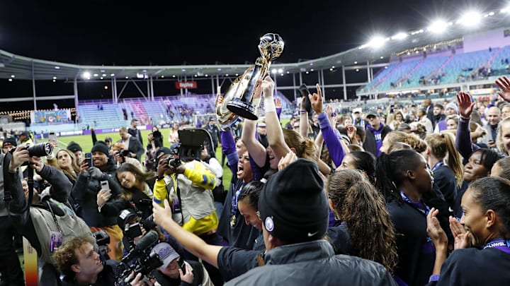 Nov 23, 2024; Kansas City, Missouri, USA; The Orlando Pride celebrates after their win in the 2024 NWSL Championship match at CPKC Stadium. Mandatory Credit: Kylie Graham-Imagn Images