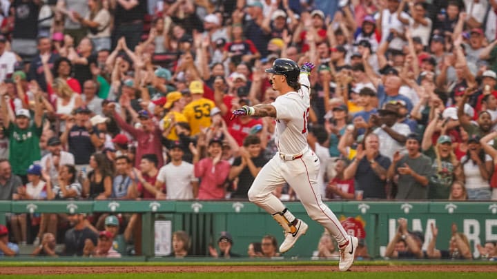 Aug 4, 2025; Boston, Massachusetts, USA; Boston Red Sox outfielder Jarren Duran (16) hits a three run home run against the Kansas City Royals in the first inning at Fenway Park. Mandatory Credit: David Butler II-Imagn Images