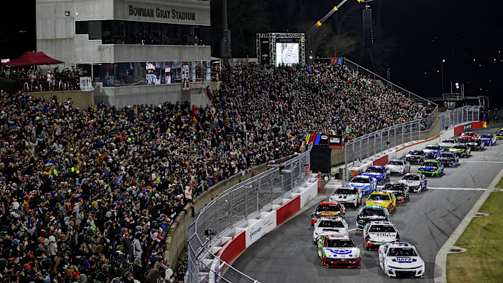 Feb 2, 2025; WInston-Salem, North Carolina, USA; NASCAR Cup Series driver Chase Elliot (9) leads the start of the Clash at Bowman Gray at Bowman Gray Stadium.