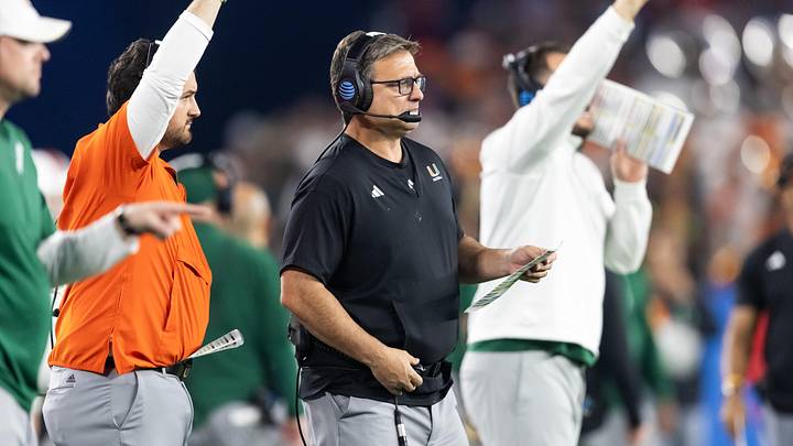 Jan 8, 2026; Glendale, AZ, USA; Miami Hurricanes offensive coordinator Shannon Dawson against the Mississippi Rebels during the 2026 Fiesta Bowl and semifinal game of the College Football Playoff at State Farm Stadium. Mandatory Credit: Mark J. Rebilas-Imagn Images