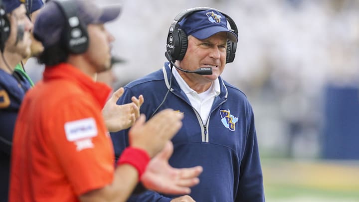 Sep 27, 2025; Morgantown, West Virginia, USA; West Virginia Mountaineers head coach Rich Rodriguez reacts on the sidelines during the third quarter against the Utah Utes at Milan Puskar Stadium. Mandatory Credit: Ben Queen-Imagn Images