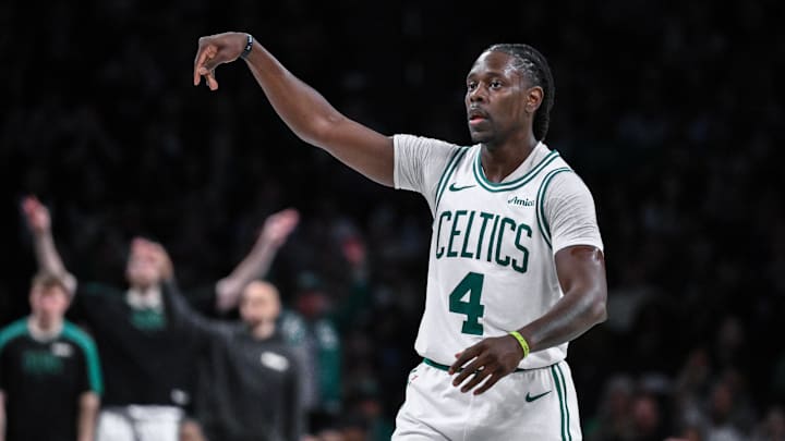 Mar 15, 2025; Brooklyn, New York, USA; Boston Celtics guard Jrue Holiday (4) reacts after making a three point shot ]against the Brooklyn Nets during the second half at Barclays Center. Mandatory Credit: John Jones-Imagn Images