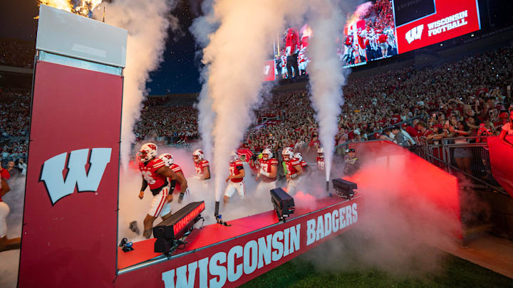 The Wisconsin Badgers football runs onto the field before their game against Miami (Ohio) Thursday, August 28, 2025 at Camp Randall Stadium in Madison, Wisconsin.
