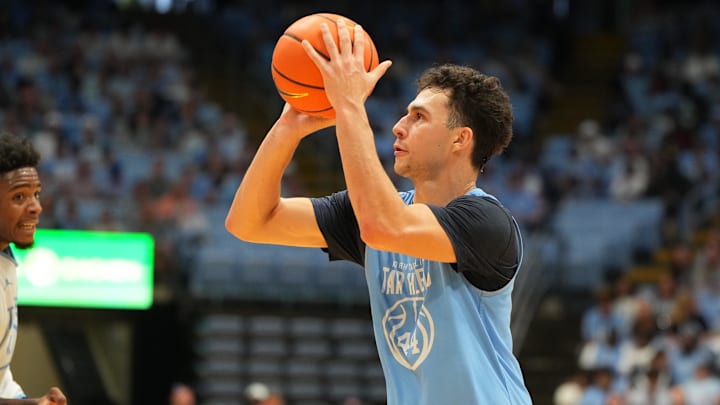 Oct 4, 2025; Charlotte, NC, USA; North Carolina Tar Heels guard Luka Bogavac (44) shoots in the second half at Dean E. Smith Center. Oct 4, 2025; Charlotte, NC, USA; North Carolina Tar Heels guard Luka Bogavac (44) shoots in the second half at Dean E. Smith Center.