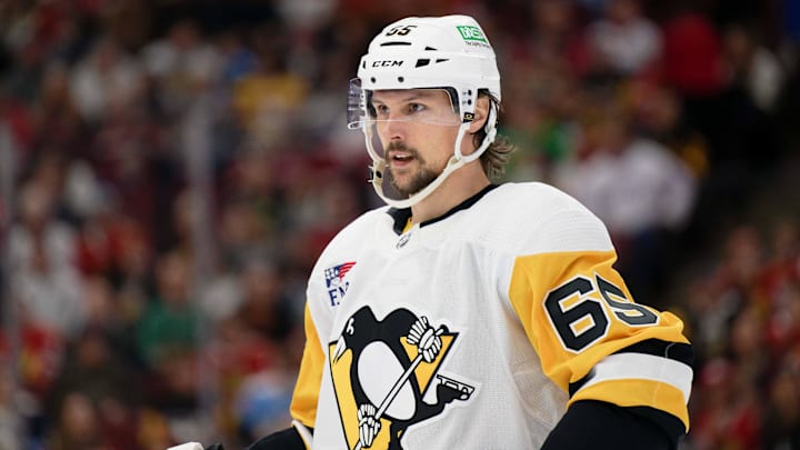 Feb 15, 2024; Chicago, Illinois, USA; Pittsburgh Penguins forward Erik Karlsson (65) skates against the Chicago Blackhawks at United Center. Feb 15, 2024; Chicago, Illinois, USA; Pittsburgh Penguins forward Erik Karlsson (65) skates against the Chicago Blackhawks at United Center.