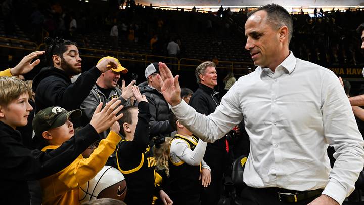 Feb 8, 2026; Iowa City, Iowa, USA; Iowa Hawkeyes head coach Ben McCollum reacts with fans after the game against the Northwestern Wildcats at Carver-Hawkeye Arena. Mandatory Credit: Jeffrey Becker-Imagn Images