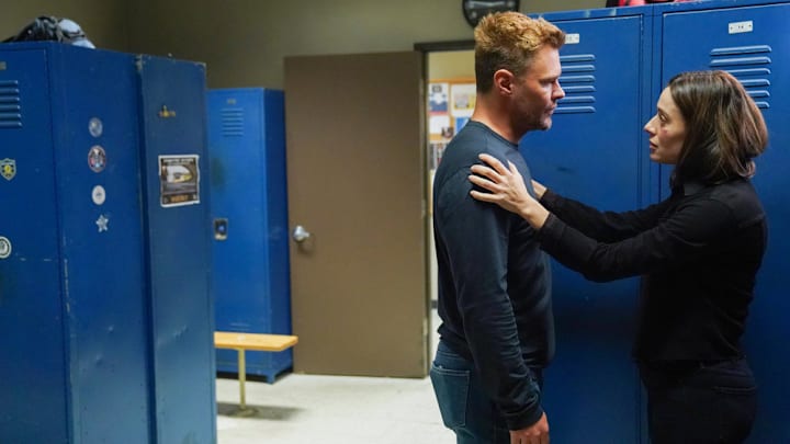 CHICAGO P.D. -- "Pawns" Episode 12006 -- Pictured: (l-r) Patrick Flueger as Adam Ruzek, Marina Squerciati as Kim Burgess