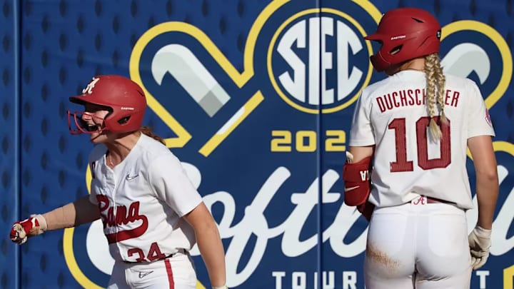 Alabama Softball Player Marlie Giles (34) celebrating against Auburn in the SEC Tournment at Jack Turner Softball Stadium in Athens, GA on Tuesday, May 6, 2025. Alabama Softball Player Marlie Giles (34) celebrating against Auburn in the SEC Tournment at Jack Turner Softball Stadium in Athens, GA on Tuesday, May 6, 2025.