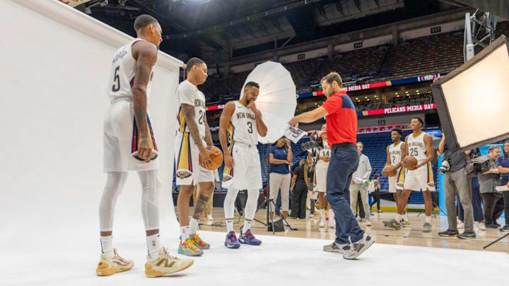 Dejounte Murray, Jordan Hawkins and CJ McCollum, left, get their photo taken by team photographer Layne Murdoch Jr., center, during Pelicans Media Day at the Smoothie King Center in New Orleans on Monday, September 30, 2024. Dejounte Murray, Jordan Hawkins and CJ McCollum, left, get their photo taken by team photographer Layne Murdoch Jr., center, during Pelicans Media Day at the Smoothie King Center in New Orleans on Monday, September 30, 2024.