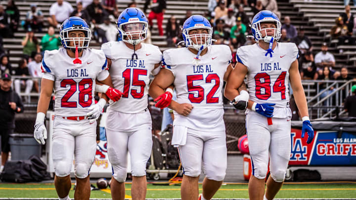 Los Alamitos captains take the field before taking on Inglewood on August 25, 2025.