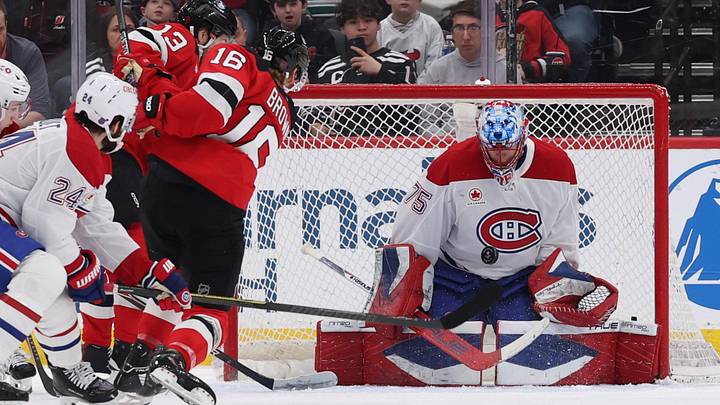 Apr 4, 2026; Newark, New Jersey, USA; Montréal Canadiens goaltender Jakub Dobes (75) makes stops the puck against the New Jersey Devils during the first period at Prudential Center. Mandatory Credit: Thomas Salus-Imagn Images