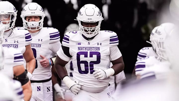 Northwestern Wildcats guard Ezomo Oratokhai takes the field before a game vs. the Michigan Wolverines on November 23, 2024.