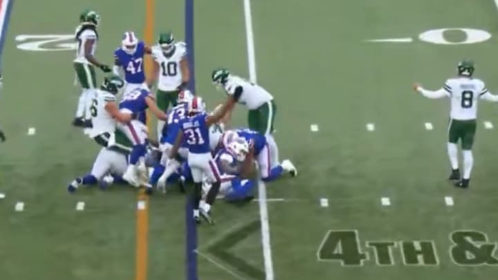 Aaron Rodgers reacts to another Jets drive ending without points.