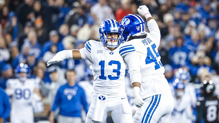 Tausili Akana and Viliami Po'uha against Cincinnati