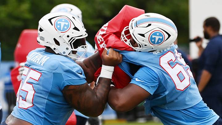 Tennessee Titans offensive tackle J.C. Latham (55) blocks teammate Aamil Wagner (69) in a drill during training camp practice at Vanderbilt Health Football Center Saturday, August 1, 2026, in Nashville, Tenn. Tennessee Titans offensive tackle J.C. Latham (55) blocks teammate Aamil Wagner (69) in a drill during training camp practice at Vanderbilt Health Football Center Saturday, August 1, 2026, in Nashville, Tenn.